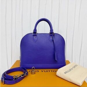 Ultra Rare Purple color 100% Authentic Louis
Vuitton Alma PM